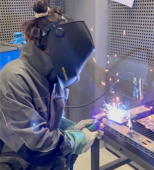 Technician performing a weld with a Car-O-Liner spot welder