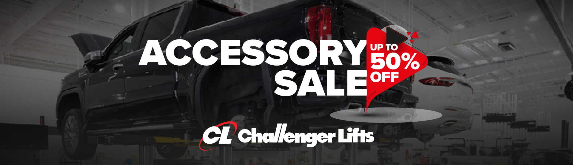 A truck being serviced while on a lift background -"Accessory Sale up to 50% off"